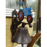A blue tractor door bell CONDITION: Please Note - we do not make reference to the