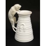 A late 19thC Copeland, Spode cat and milk churn jug, in white. 6'' high.