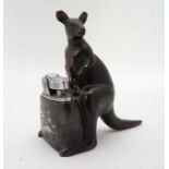 A Japanese novelty table lighter in the form of a kangaroo 3 1/2" high CONDITION: