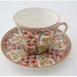 A 19thC hand painted cup and saucer ,