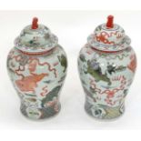 A pair of large Oriental pots and covers CONDITION: Please Note - we do not make