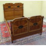 A late 18thC satinwood bed with hand painted oval cartouches and gilt brass decoration 47 1/2" wide