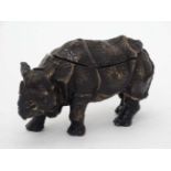 A late 20thC bronze rhino inkwell CONDITION: Please Note - we do not make reference