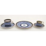 A collection of early 20thC Royal Worcester cups, saucers and plate in '' Royal Lily Pattern '',