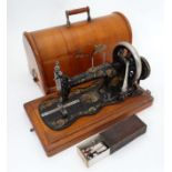 Cased singer sewing machine CONDITION: Please Note - we do not make reference to