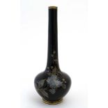 A late 19thC / early 20thC black glass vase with hand painted floral chrysanthemum decoration and
