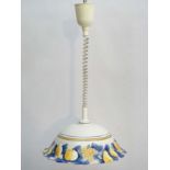 A rise and fall pendant lamp with pottery hand painted shade .