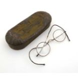 A pair of old circular glasses in a named WWII military case CONDITION: Please Note