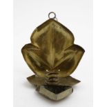 J S & SB : An Art Nouveau wall hanging brass candle sconce with leaf reflector and triangular vesta