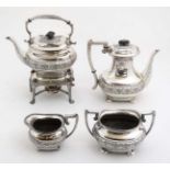 A four piece silver plate tea set / coffee set with banded floral and reeded decoration,