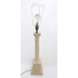 A ceramic Corinthian column table lamp on squared soccle The whole 28" high CONDITION: