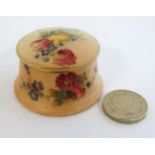 A c1904 Royal Worcester blush ivory miniature pot and cover decorated with flowers,