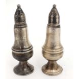 A pair of American sterling silver weighted pepperettes. Maker Watrous Mfg.