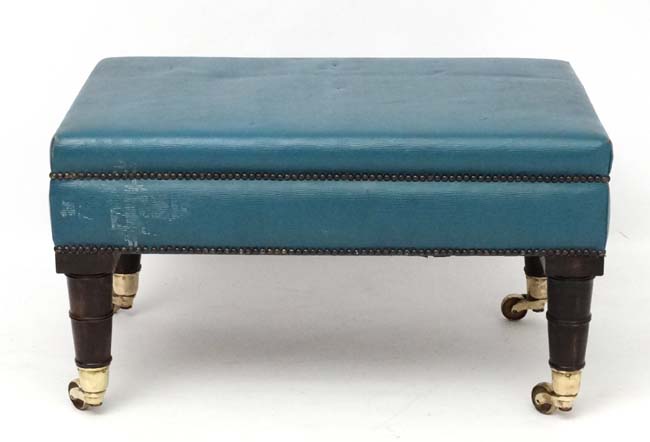 An 18thC style leather upholstered four legged stool on castors. - Image 3 of 4