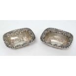 A pair of Victorian silver salts with embossed decoration hallmarked Birmingham 1898 maker William