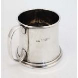 A silver Christening mug with loop handle. Hallmarked London 1908 maker Mappin & Webb.