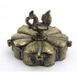 A 17thC / 18thC Indian petal formed brass spice container,