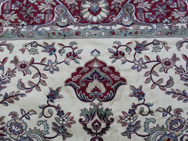 Carpet / Rug : a Tabriz machine made beige ground carpet, with sage green ground central medallion, - Image 7 of 8
