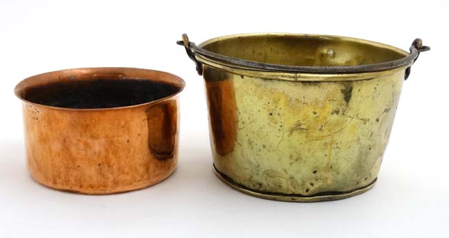 A brass jam pan with wing over handle together with a copper pot stamped A Fountaine Bros,