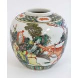 A Chinese Famille Verte Ginger jar decorated with warring figures on horseback. 5 1/4'' high.