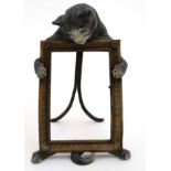 A 21stC hand painted cast bronze easle / strut frame with cat decoration approx 10 1/2" high