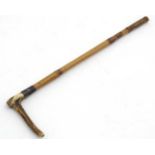 Equestrian : An early 20thC Antler handled , Bamboo shafted Hunting Crop / Whip ,