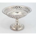 A silver pedestal bon bon dish with fret work decoration. Hallmarked Birmingham 1925 maker J.B.J.