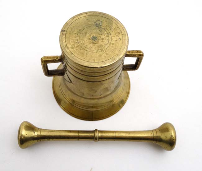 A 20thC brass two handled brass mortar and pestle. - Image 2 of 4