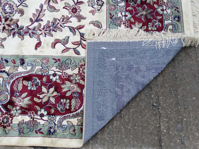 Carpet / Rug : a Tabriz machine made beige ground carpet, with sage green ground central medallion, - Image 6 of 8