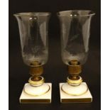 A pair of white ceramic candlestick bases by Halcyon Days, Hammersley & Co,