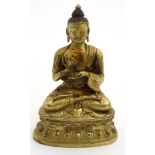 A 19thC Chinese gilded brass buddhavista sat upon a lotus base and marked with 7 characters.