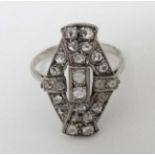 An 18ct white gold ring set with a profusion of diamonds in an Art Deco style setting