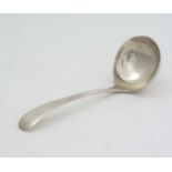 A silver sauce/cream ladle. Hallmarked Sheffield 1925 maker Mappin & Webb Ltd.