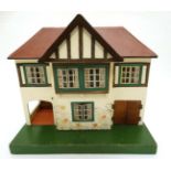 A Triang wooden 1950s Stockbroker dolls house, number 61 ,