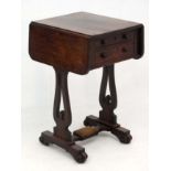 A Regency Rosewood work table with drop flaps, 2 drawers etc.