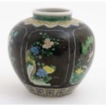 A Chinese famille noir bulbous vase,