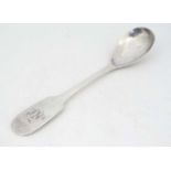 A Geo III silver fiddle pattern mustard spoon hallmarked Newcastle 1802.