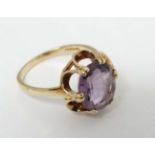 A 9ct gold ring set with amethyst CONDITION: Please Note - we do not make