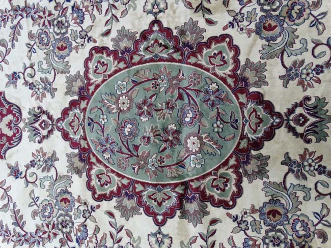 Carpet / Rug : a Tabriz machine made beige ground carpet, with sage green ground central medallion, - Image 3 of 8