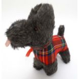 A c1960s '' Wendy Boston , Made in England '' Scottie Dog plush toy, bears original label to leg.