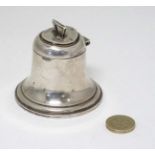 A silver inkwell formed as a bell. Hallmarked Birmingham 1942.