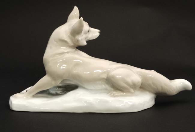 A figurine modelled as a fox with duck at its feet, - Image 4 of 6