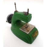 A Childs vintage 1950s '' Palitoy '' sewing machine, made in England, in green ,