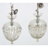 A pair of pendant drop glass bag light fittings with lustre drops.