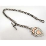 A silver albert watch chain with Hallmarked silver fob dated Birmingham 1919 maker William Hair