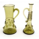 2 items of mid 20thC Retro olive green glass comprising a jug and oil bottle both with prunt like