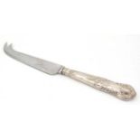 A silver handled cheese knife. Hallmarked Sheffield 1991 maker HB.