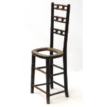 A 19thC ebonised faux bamboo Mendlesham correctional chair 35" high CONDITION: