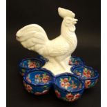 A Les Bleus de Louviere France , Longwy style pottery enamelled egg holder with cockerel to centre ,
