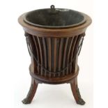 Edwardian mahogany jardiniere with ribbed sides on triform base CONDITION: Please